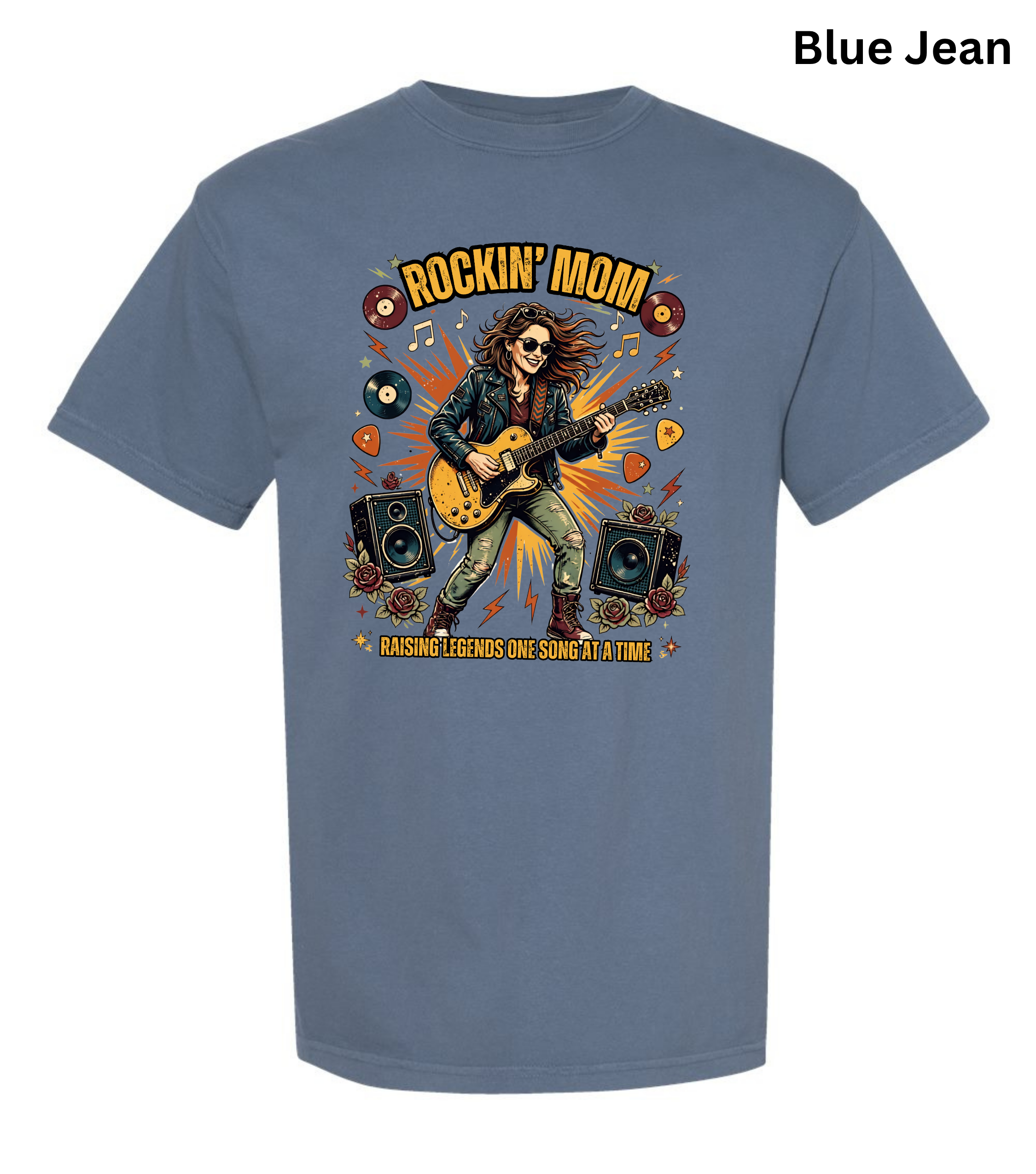 A blue jean wash short-sleeve t-shirt with a colorful graphic of a rock musician playing an electric guitar, surrounded by speakers, guitar picks, and the text 'ROCKIN' MOM' and 'GASOLINE LEGENDS ONE SONG AT A TIME!'. A 'Blue Jean' color label is visible in the top right corner.