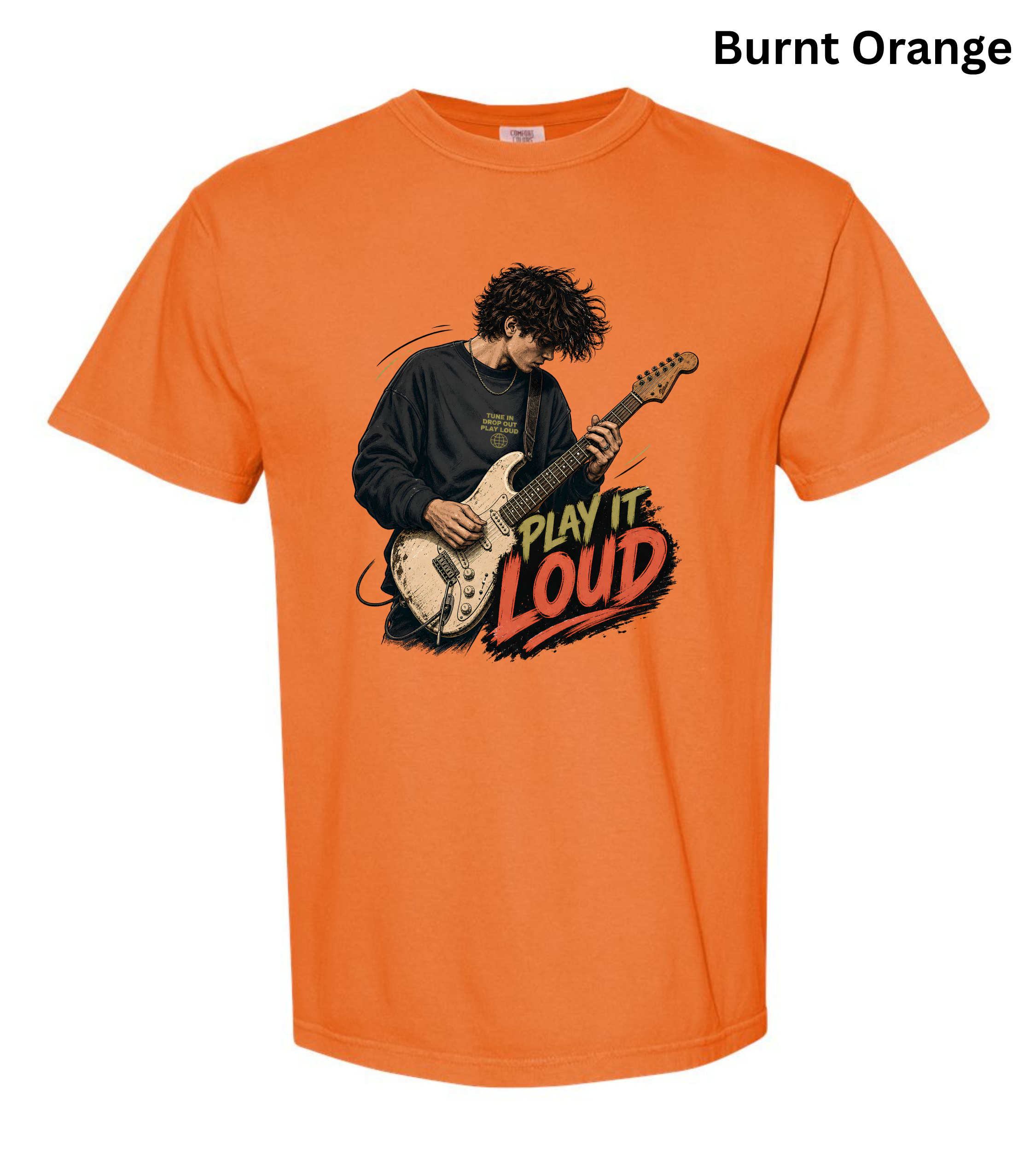 An orange short-sleeve crewneck t-shirt featuring a graphic of a man playing an electric guitar with the text 'PLAY IT LOUD' in a stylized font. The text 'Burnt Orange' is written in black at the top right corner.