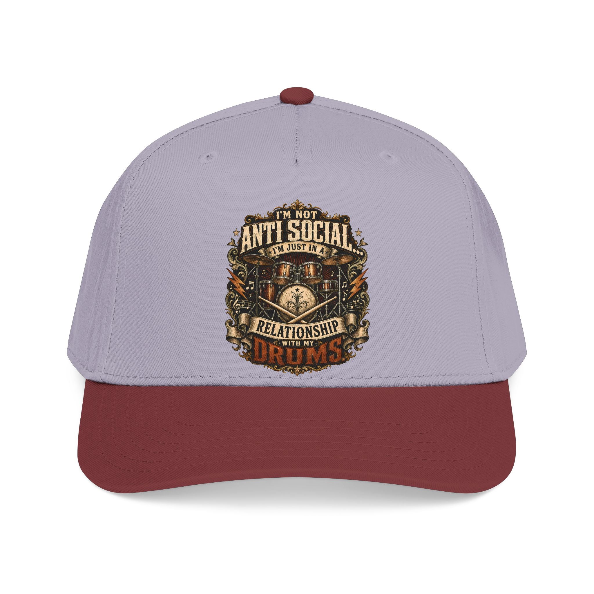 A structured baseball cap with a light lavender-purple crown and a dark maroon brim, featuring a detailed graphic on the front that reads 'I'M NOT ANTI SOCIAL I'M JUST DRUMS' in a vintage emblem style.