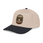 Beige and green cap with a plaid skull design and text on a white background