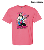 A pink short-sleeve crewneck t-shirt featuring a colorful graphic of a man playing an electric guitar with the text 'SLAP HAPPY' and 'MCDILL, ARIZ. 85011' printed below.