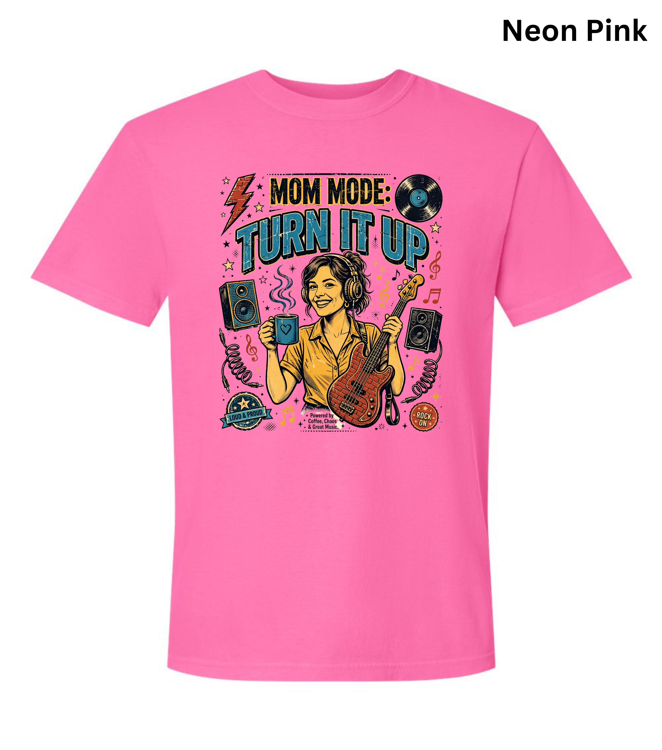 A bright neon pink short-sleeve t-shirt with a colorful graphic on the front that reads 'MOM MODE: TURN IT UP' with a woman playing guitar, speakers, and vinyl records. The text 'Neon Pink' is printed in black in the top right corner.