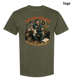 An olive sage green short-sleeve t-shirt with a vintage-style graphic of a man playing an electric guitar in a rehearsal room. The graphic features orange text reading 'DAD MODE: REHEARSAL' and 'STILL GOT THE GROOVE (MOSTLY?)'.