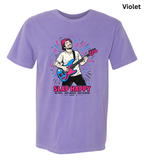 A light purple (violet) short-sleeve crewneck t-shirt featuring a colorful graphic of a man playing a blue and pink bass guitar with the text 'SLAP HAPPY' underneath, shown on a plain white background with a 'Violet' label in the top right corner.
