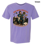 A light purple short-sleeve crewneck t-shirt featuring a colorful graphic of a man playing an electric guitar with the text 'DAD MODE: REHEARSAL' and 'WILL GOT THE BLOODY MATTER?' in orange and yellow lettering.