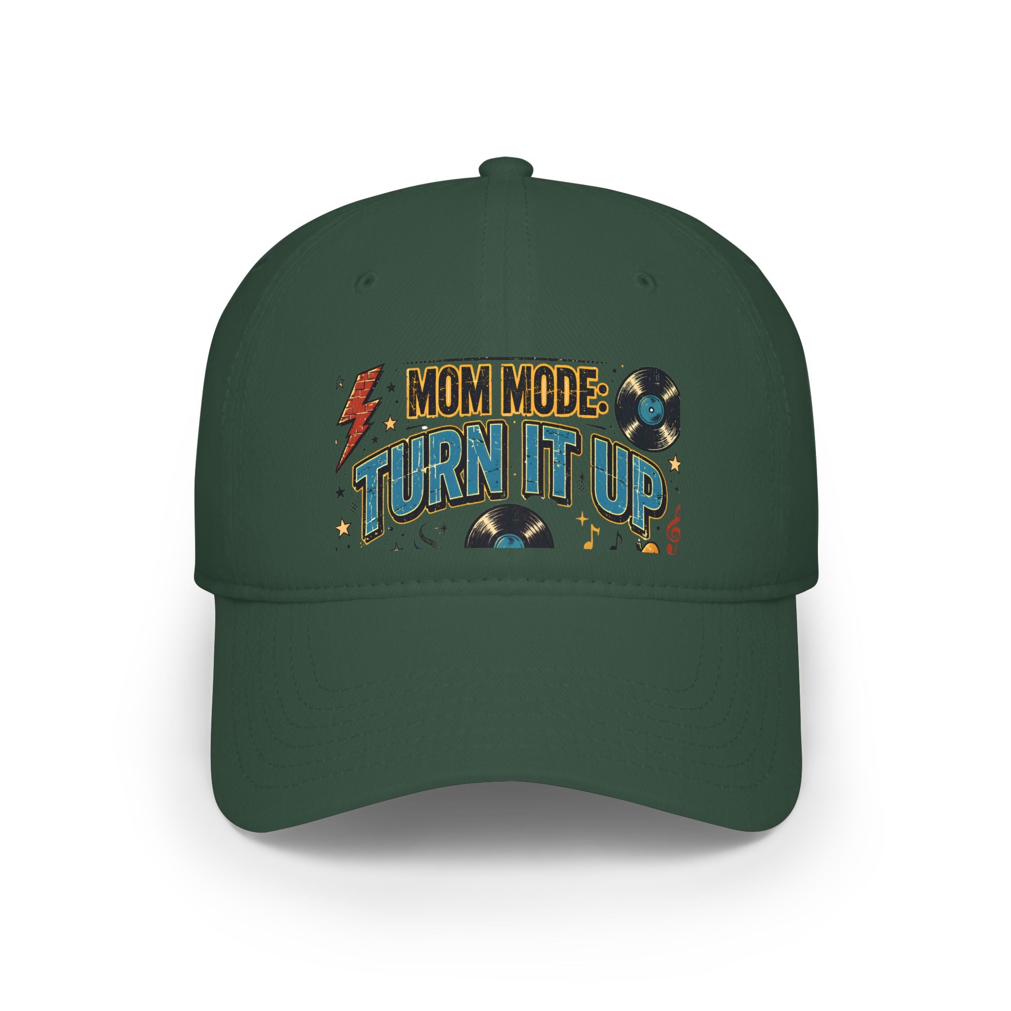 A dark green baseball cap featuring a retro-style graphic on the front that reads 'MOM MODE: TURN IT UP' in yellow and blue lettering, accompanied by vinyl records and a lightning bolt.