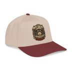 A structured baseball cap with a light beige crown and a dark burgundy curved brim, featuring a circular graphic on the front that reads 'ANTI SOCIAL DRINKS' with a bar scene illustration.