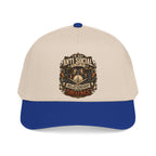 A structured baseball cap with a cream-colored crown and a royal blue visor, featuring a detailed graphic on the front that reads 'I'M NOT ANTI SOCIAL I'M JUST DRY' in a vintage, ornate font.