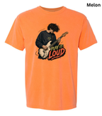 An orange short-sleeve t-shirt with a graphic of a person playing an electric guitar and the text 'PLAY IT LOUD' on the front, shown against a plain white background with the word 'Melon' in the top right corner.