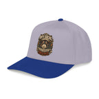 Gray cap with blue brim and embroidered patch on a white background